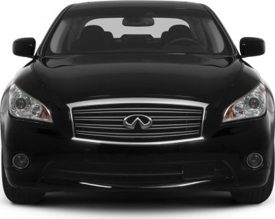 Front view with chrome grille and clear headlights
