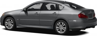 Side profile of a sedan with alloy wheels and tinted windows