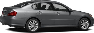 Sleek sedan side profile with alloy wheels and dual exhaust