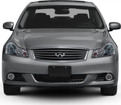 Front view of sedan featuring headlights, grille, and fog lights
