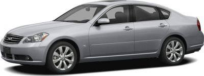 Silver four-door sedan with alloy wheels and side profile