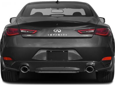 Rear view showing LED taillights and dual exhaust of a coupe