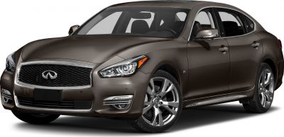 Angled front view of luxury sedan with distinctive grille and headlights