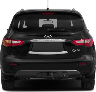 Rear view of SUV with split tail lights, chrome trim, roof antenna