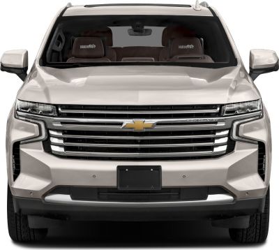 Front view of an SUV with a large chrome grille and LED headlights.