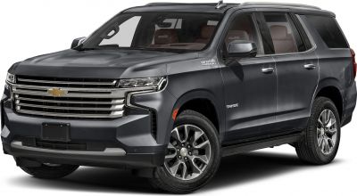Front side view of SUV with prominent grille and High Country trim
