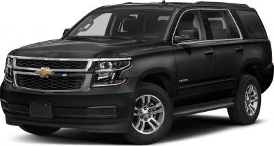 Front side view of black SUV with detailed grille and alloy wheels
