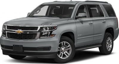 Front side view of an SUV with chrome grille and alloy wheels