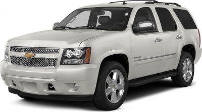 Front side view with chrome mesh grille and alloy wheels