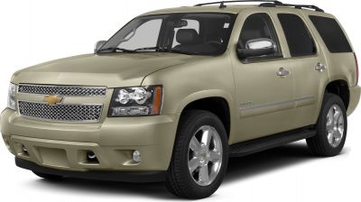 Front side view of rugged SUV with chrome grille and dual headlights