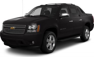 Front and side view of a black pickup truck with grille and headlights.