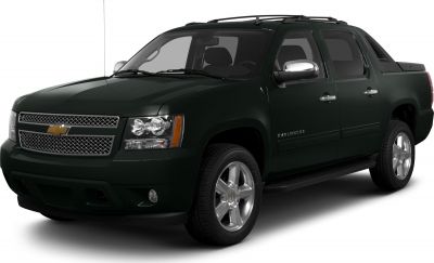 Pickup truck with front grille and alloy wheels, four doors and roof rack
