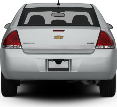 Rear view with distinct tail lights and emblems