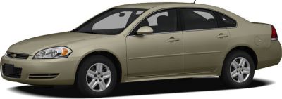 Side profile of beige four-door sedan with alloy wheels