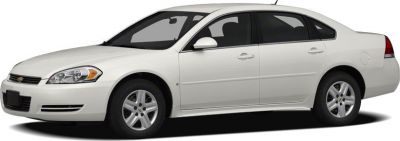 White four-door sedan side profile with smooth body lines