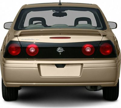 Rear view with round red tail lights and black trim panel