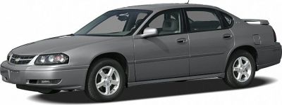 Front side view of a gray four-door sedan with alloy wheels