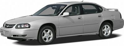 Side view of a full-size sedan with alloy wheels and classic design.