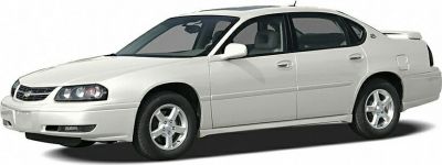 White four-door sedan side profile with alloy wheels