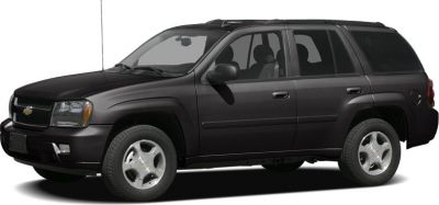 Black mid-size SUV side view with four doors and roof rack