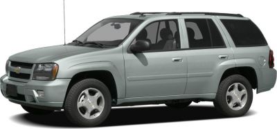 Silver 4-door SUV side profile with visible wheels and roof rails
