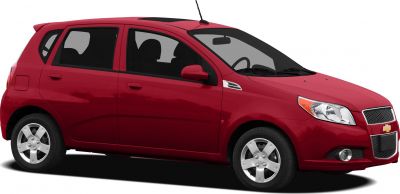 Red compact hatchback with distinctive front grille and alloy wheels