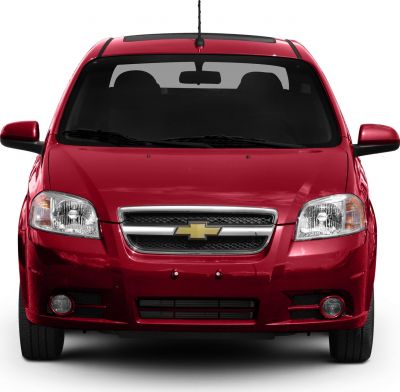 Front view showing grille, headlights, fog lights