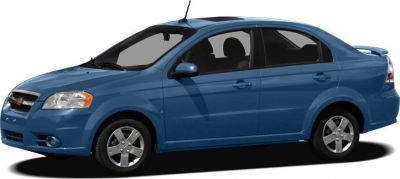 Side profile of a blue four-door compact sedan with alloy wheels.