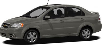 Side profile of a compact sedan with alloy wheels