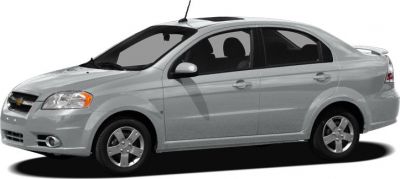 Silver four-door compact sedan with alloy wheels and sunroof