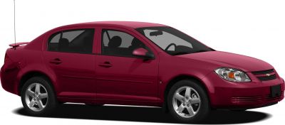 Red compact sedan with front grille, headlights, and alloy wheels side view