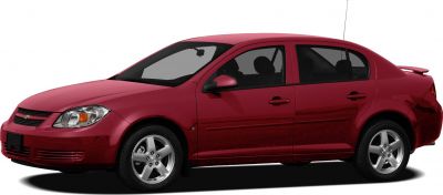 Side view of a red mid-2000s sedan with alloy wheels and four doors