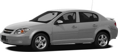 Side profile of a compact 4-door sedan with alloy wheels