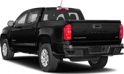 Rear and side view of black extended cab long box pickup.