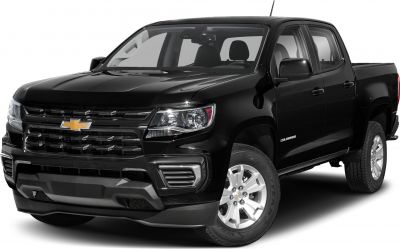 Front view of black extended cab pickup with long box.