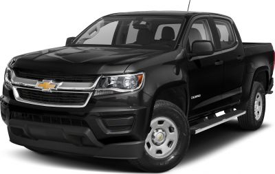 Black double cab pickup with chrome grille and step bars