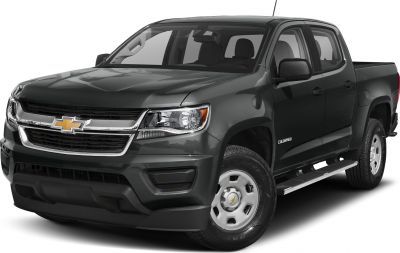 Front angled view of pickup with grille, headlights, and side steps