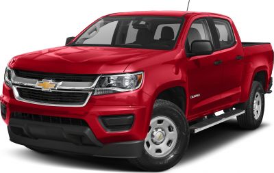 Red pickup truck front view with prominent grille and crew cab