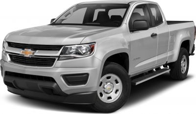 Front angled view of extended cab pickup with long box and side step bar