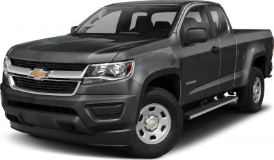 Front-side view of extended cab pickup with long cargo bed and steel wheels