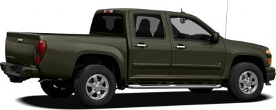Side view of mid-size pickup with crew cab and bed