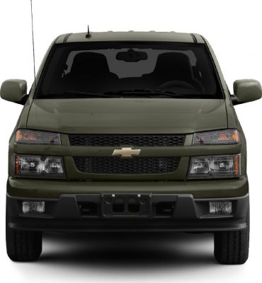 Close-up of pickup truck front with headlights, grille, and bumper details