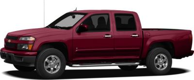 Side profile of extended cab pickup with chrome wheels and running boards