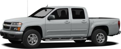 Side view of a silver pickup with crew cab and extended bed