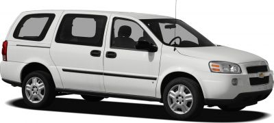 Extended white minivan with sliding doors and roof antenna