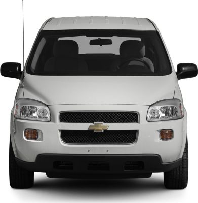 Close-up front view with prominent grille and headlights