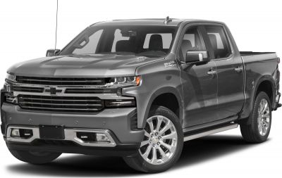 Front side view of pickup with prominent grille and LED headlights