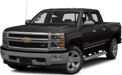 Front view of pickup truck with chrome grille and alloy wheels