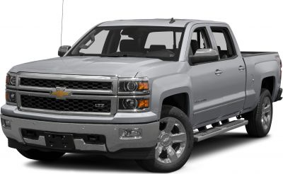 Front angle with chrome grille and large alloy wheels