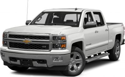 Front grille, headlights, and side step of a crew cab pickup truck